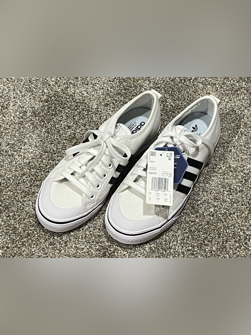 adidas White Canvas Sneakers with Black Stripes